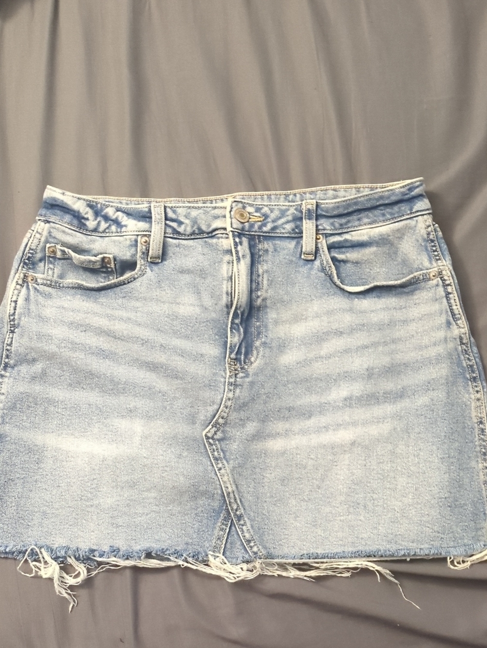 SO Light Blue Washed Denim Mini Skirt with Frayed Hem